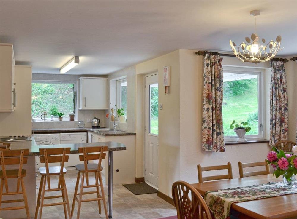 Large kitchen/diner with breakfast bar at Bellegrove Cottage in Watermillock, Ullswater, Cumbria