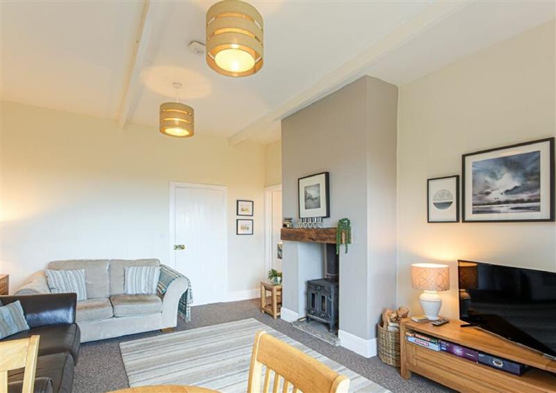 Relax in the living area at Bellshill Cottage, Belford