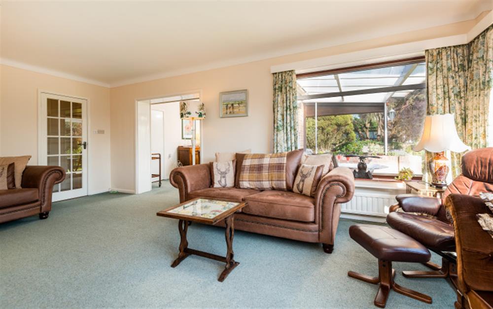 Relax in the living area (photo 3) at Belmore End in Lymington
