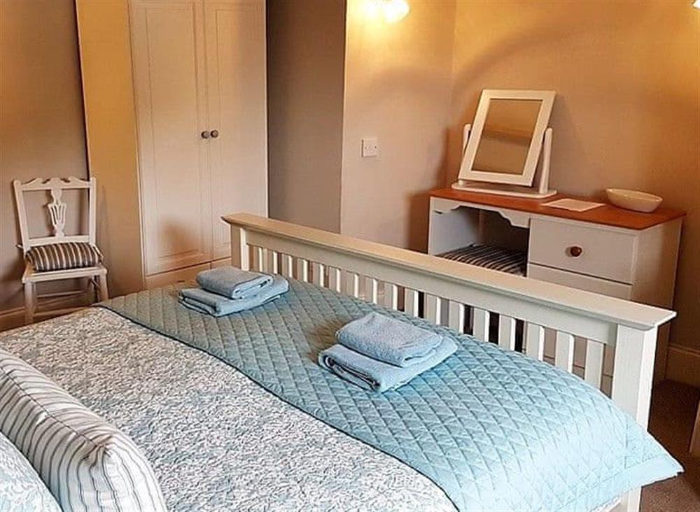 Charming king size bedroom at Below Deck in Fowey, Cornwall