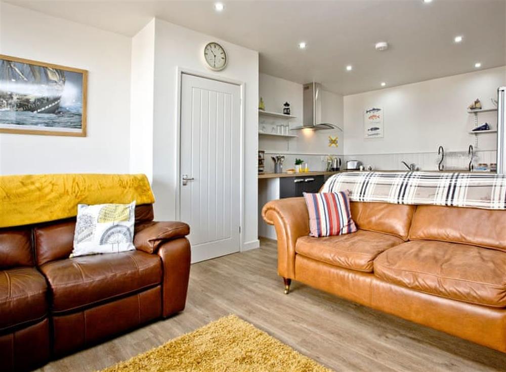 Bright and colourful open plan living space (photo 3) at Below Decks in Turnchapel, near Plymouth, Devon