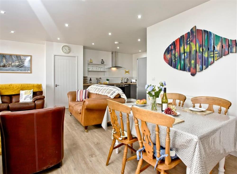 Bright and colourful open plan living space at Below Decks in Turnchapel, near Plymouth, Devon