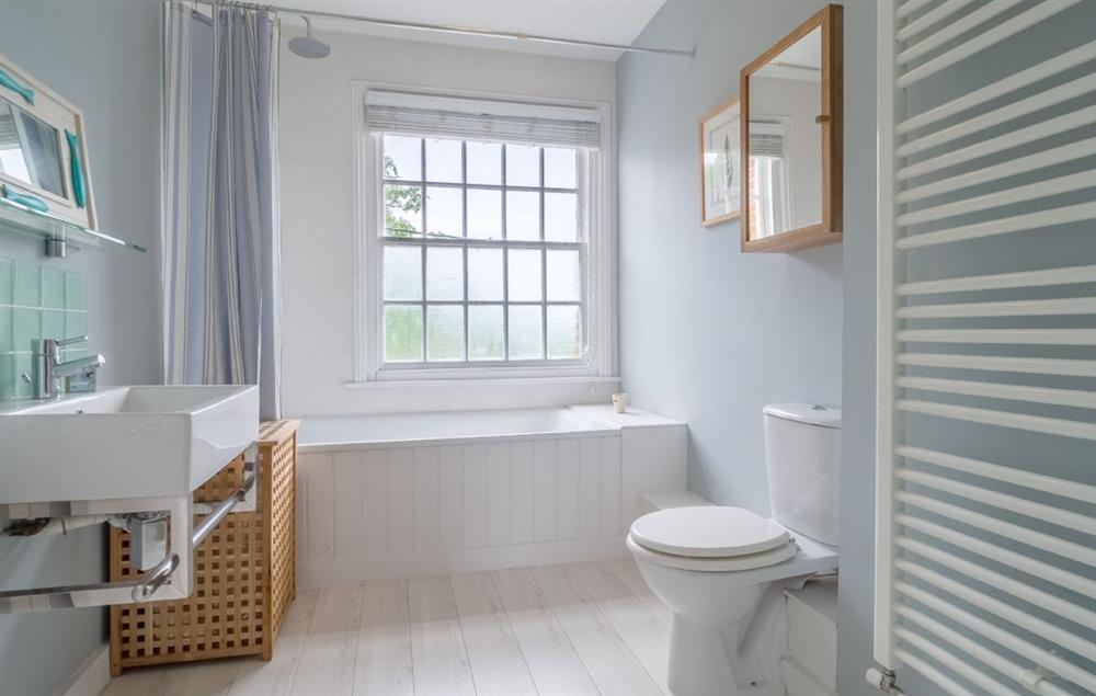 First floor: Family bathroom with shower over the bath at Belstead House, Aldeburgh
