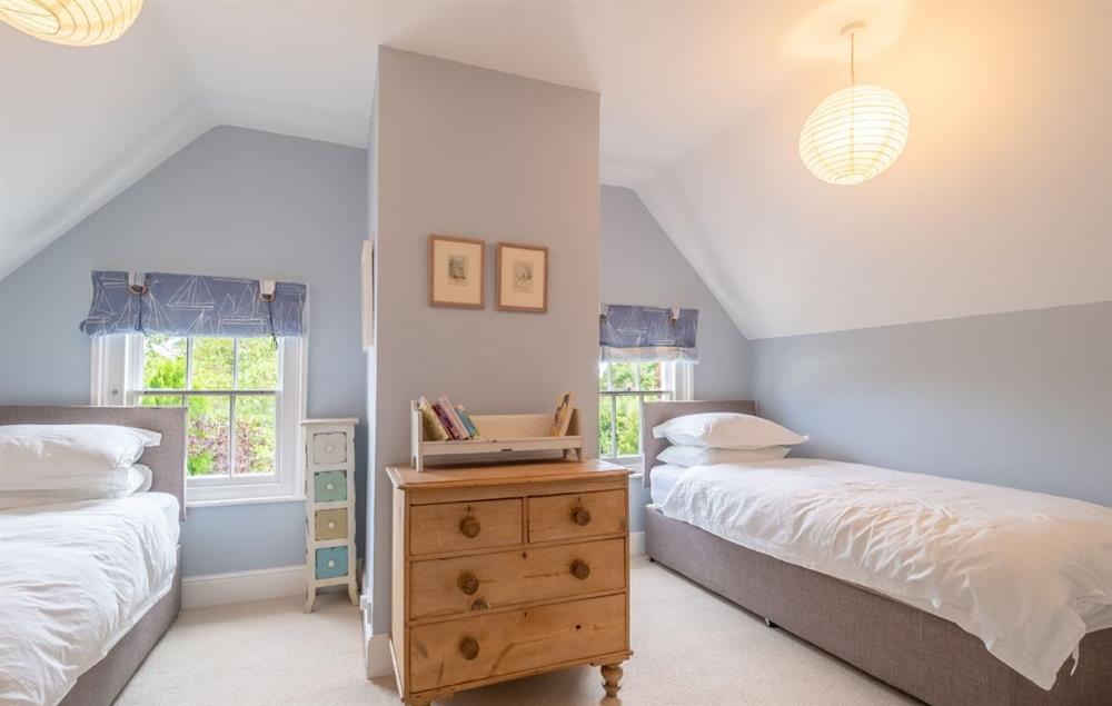 Second floor: Bedroom five with two single beds at Belstead House, Aldeburgh