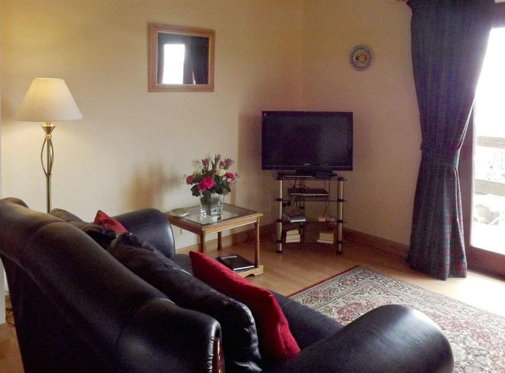 Open plan living/dining room/kitchen at Ben Alder Lodge in Campsie Fells, near Milton of Campsie, Lanarkshire