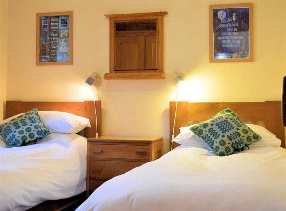 Comfortable twin bedroom at Benar Cottage in Penmachno, near Betws-y-Coed, Gwynedd