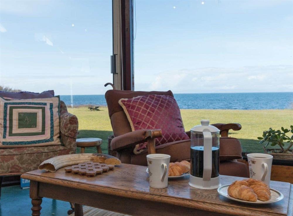 Relaxing sun room with amazing sea views at Bentfield in Prestwick, Ayrshire