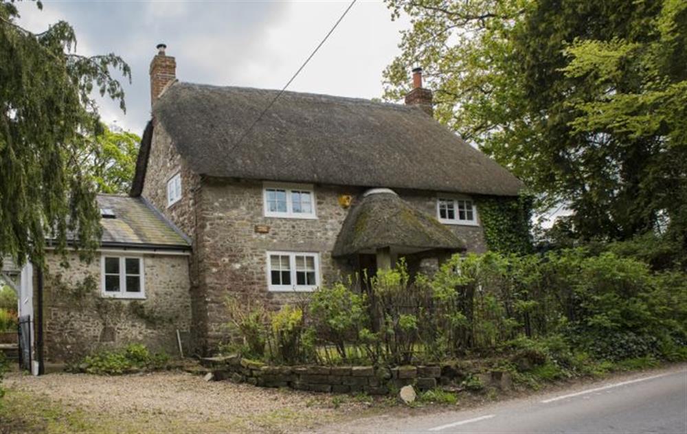 Benville Cottage is a pretty thatched cottage dating from the 17th century at Benville Cottage, Benville
