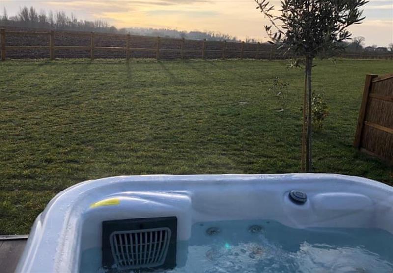 Hot tub with a rural view at Berry Hall Farm Retreat in Pennygate, Norfolk