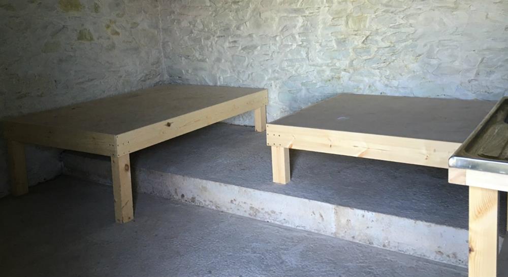 The sleeping platforms in Berry Lawn Linhay bothy.