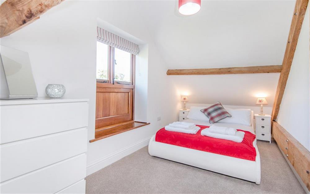 The double bedroom with countryside views at Berry's Barn in Colyton