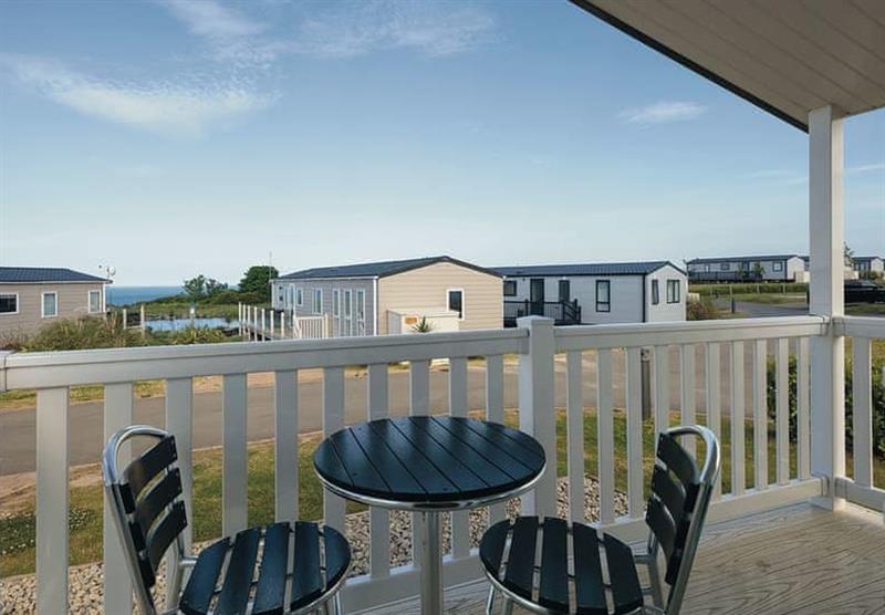 seating on the decked area in one of the caravan holiday homes at Berwick Holiday Park in Berwick–Upon–Tweed, Northumberland
