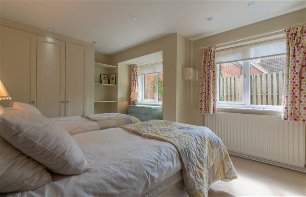 Ground floor: Bedroom three with twin beds at Bettys Cottage, Brancaster near Kings Lynn