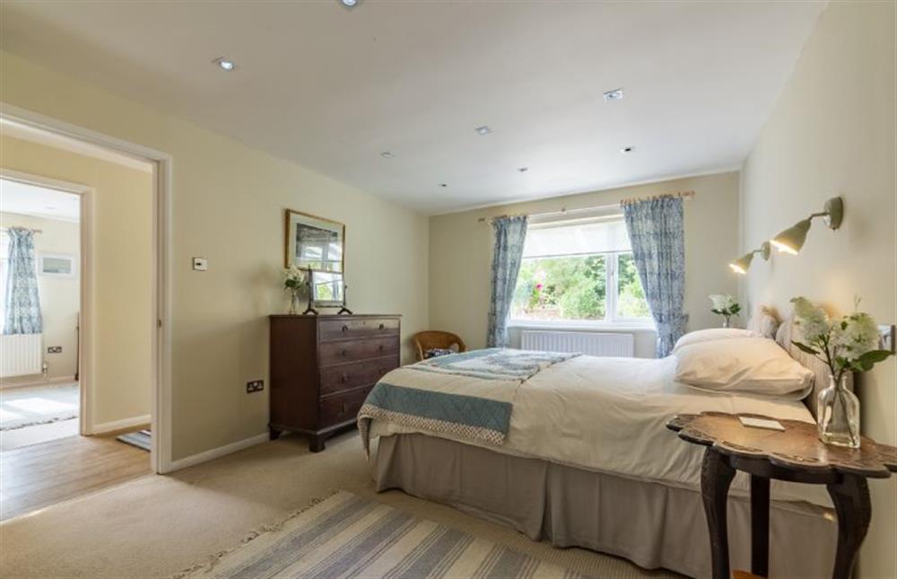 Ground floor: Master bedroom with super-king zip and link bed at Bettys Cottage, Brancaster near Kings Lynn