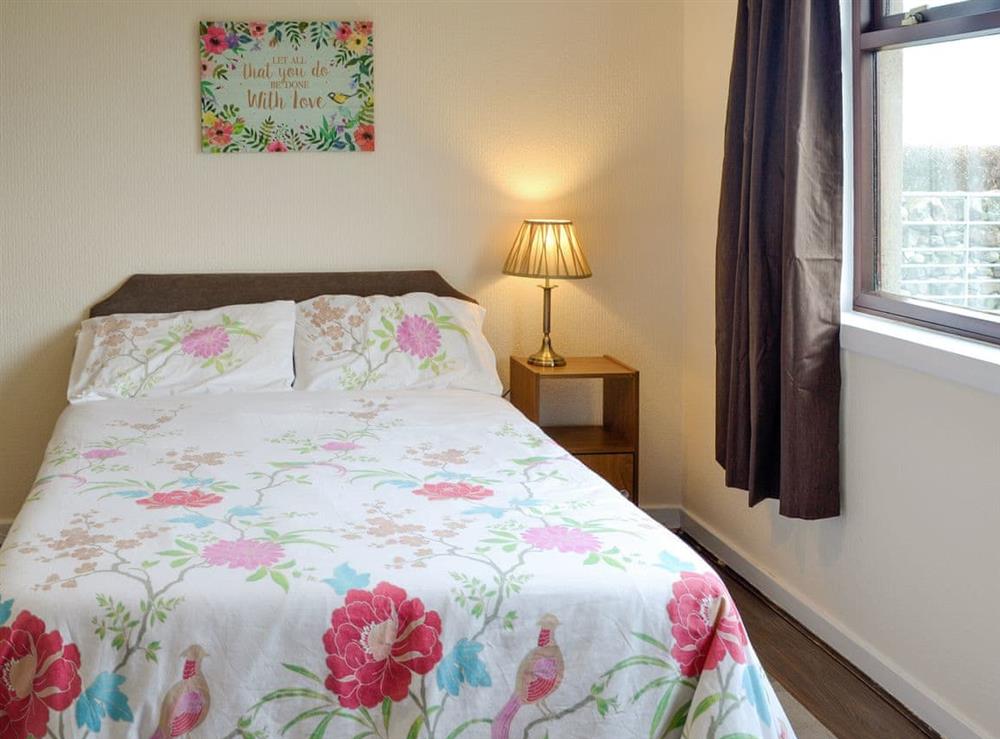 Relaxing double bedroom at Beuchan Bungalow, 