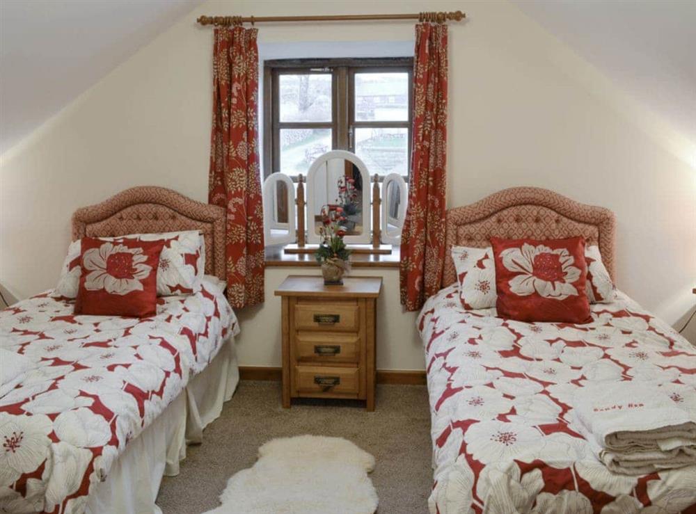 Restful twin bedroom at Beudy Hen in Llanfair, near Harlech, Gwynedd