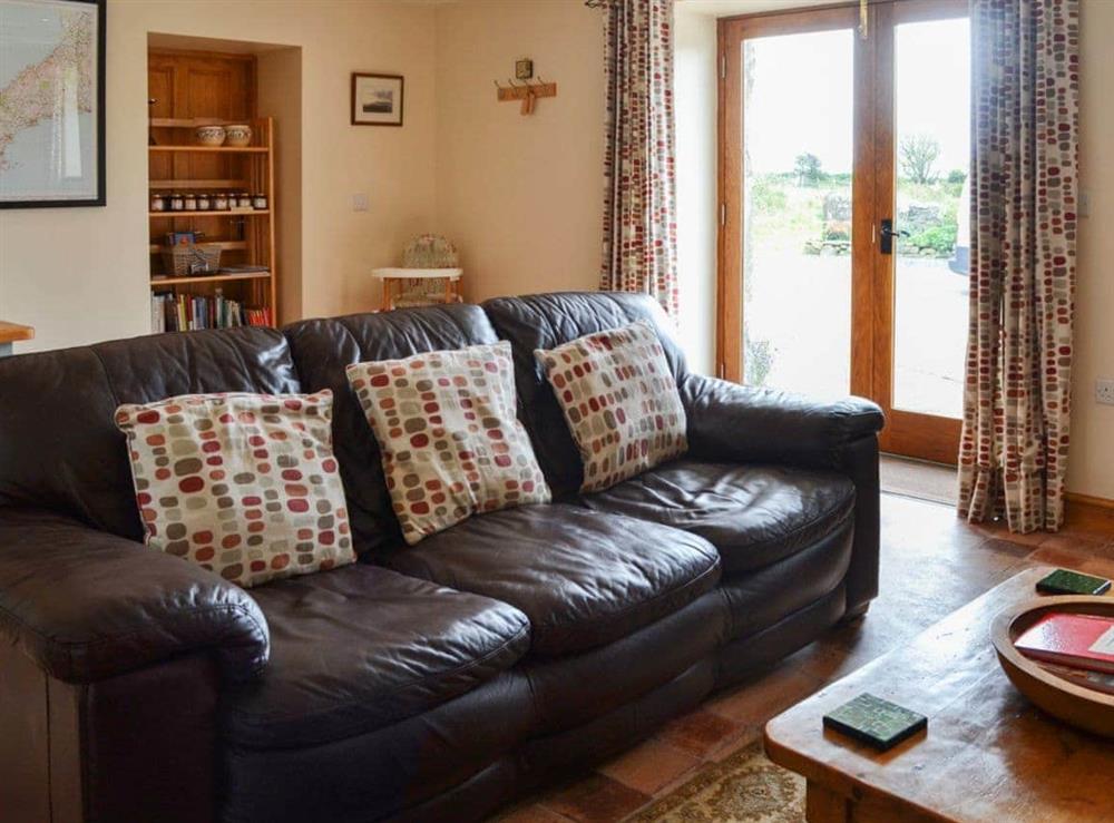 Living room/dining room (photo 2) at Beudy Isaf in Llangybi, near Pwllheli, Gwynedd