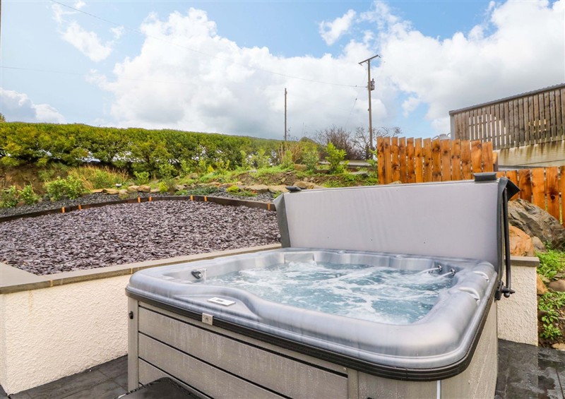 Enjoy the hot tub at Beudy, near Llanilar
