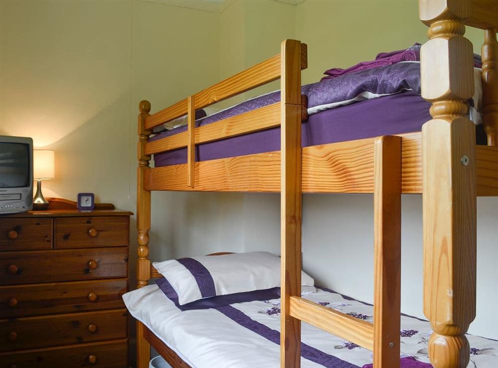 Charming children’s bunk bedded room at Bevan House in Hundred House, near Builth Wells, Powys