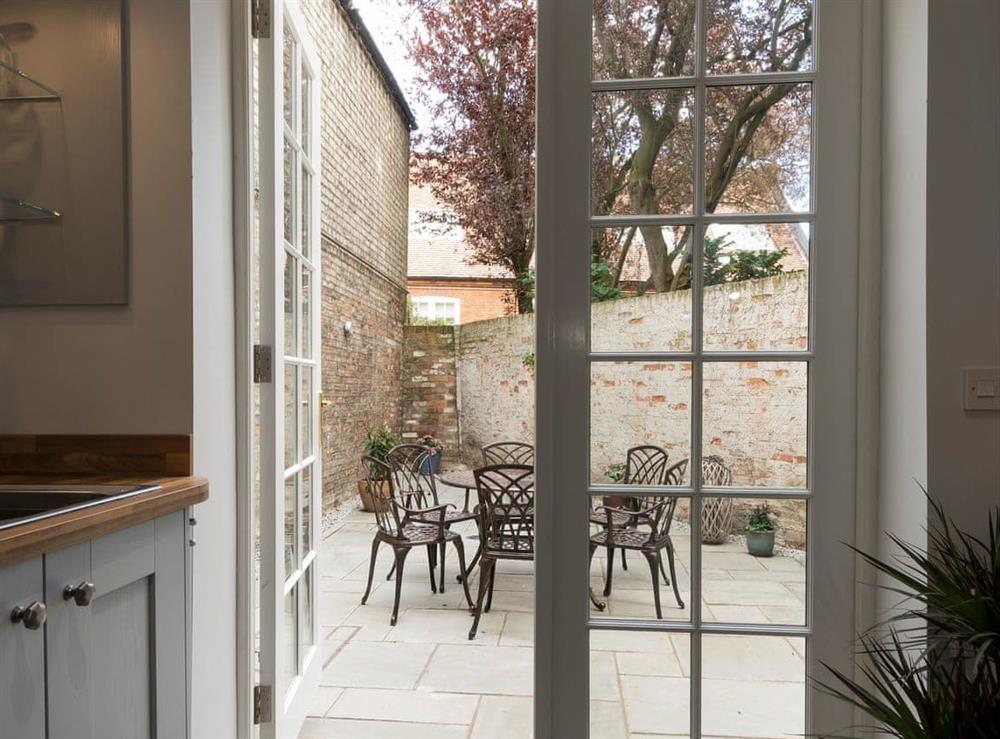 Patio doors leading onto an enclosed courtyard