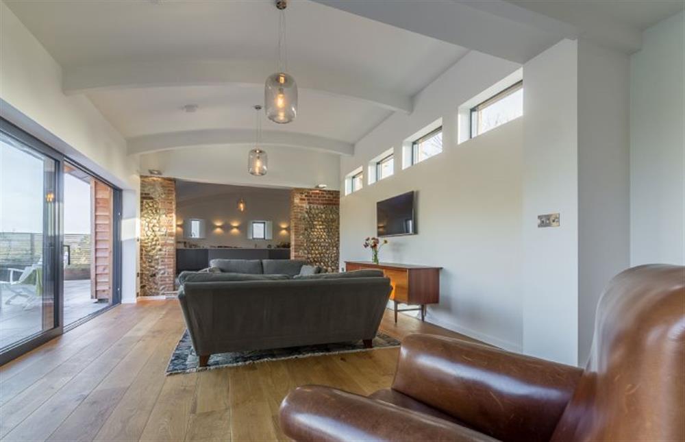 Ground floor:  Open plan living area with feature ceiling at Big Sky Barn, Ridlington near Norwich