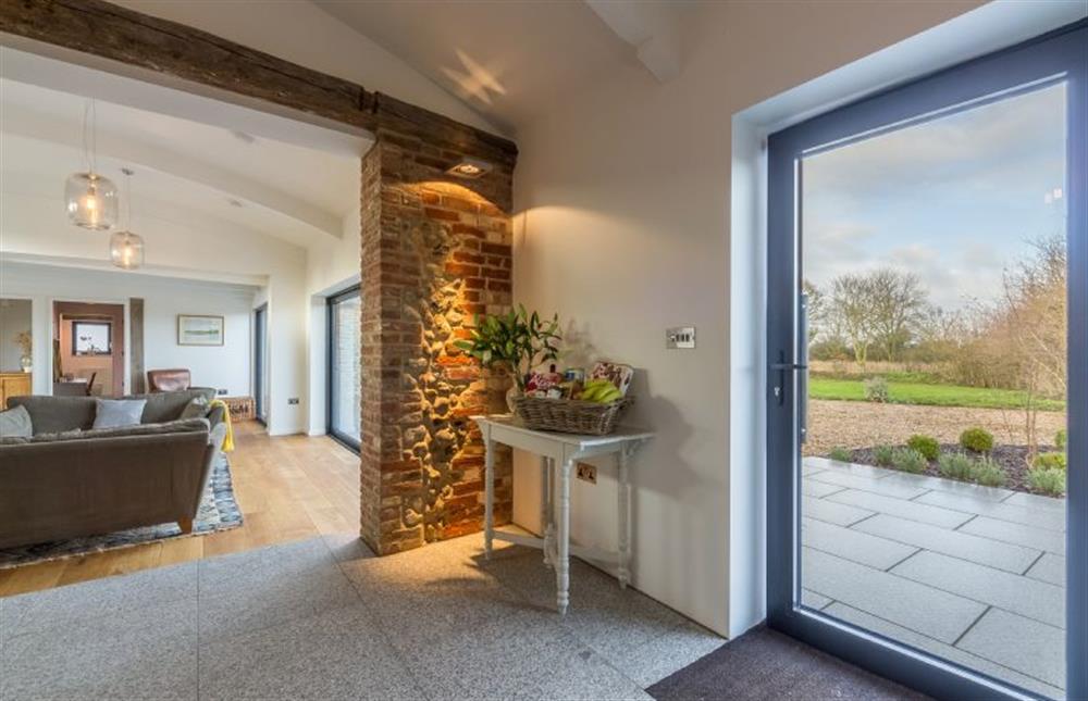 Ground floor:  View to sitting area and door to courtyard at Big Sky Barn, Ridlington near Norwich