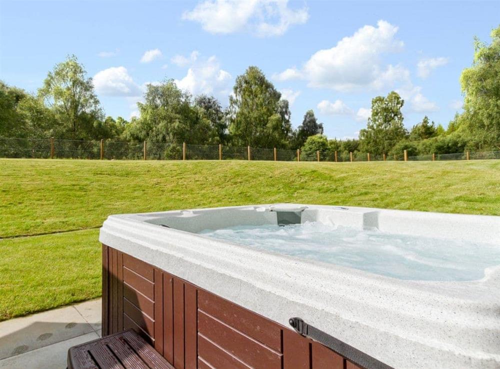 Enjoy a soak in your own private hot tub at Birch Corner in Aviemore, Inverness-Shire