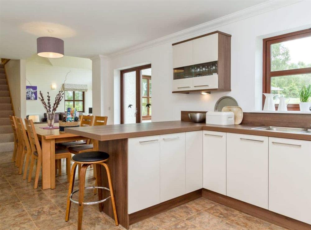 Kitchen with dining area at Birch Corner in Aviemore, Inverness-Shire