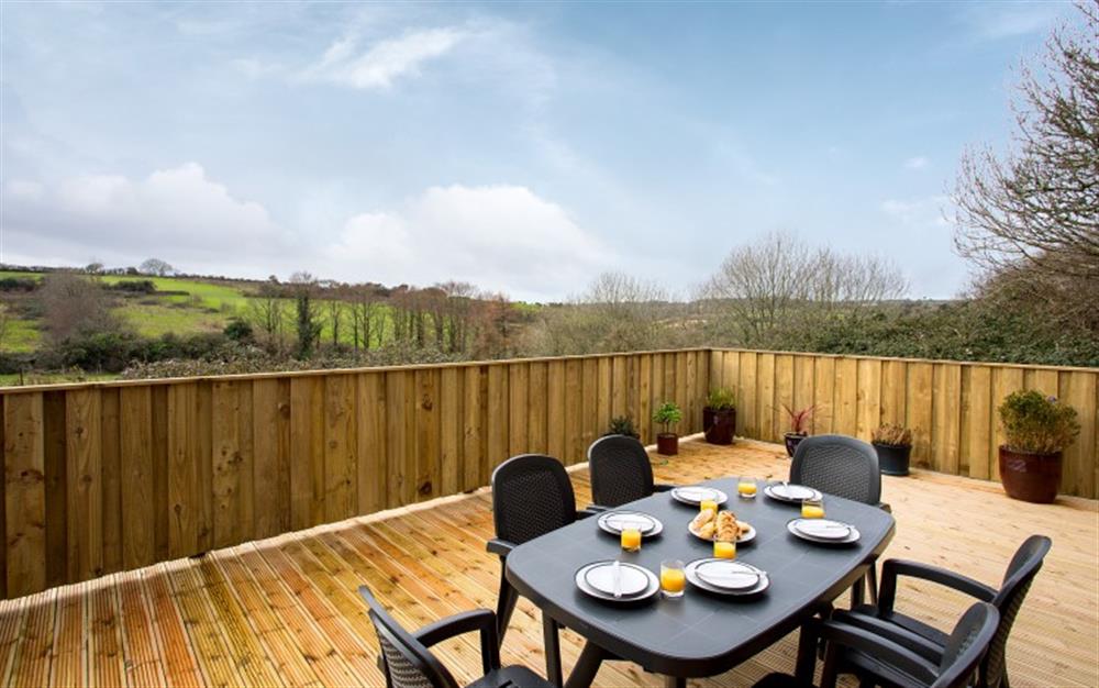 From this view, you can see how spacious and private the decking is, plus those lovely relaxing views. at Birch Cottage in Falmouth