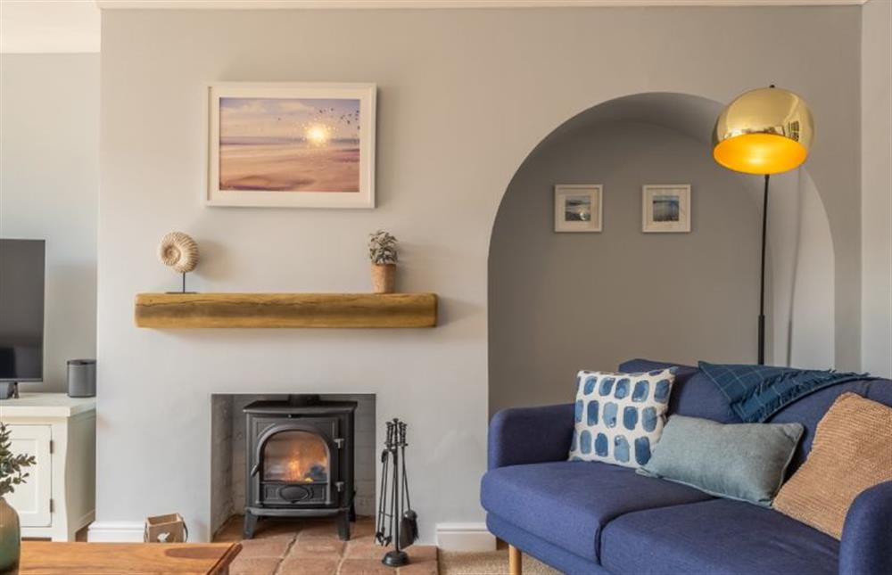 A cosy corner by the fire at Birch Cottage, Northrepps near Cromer