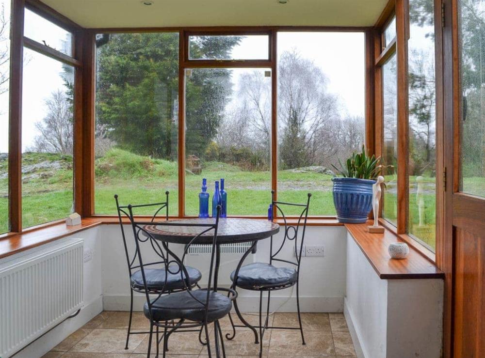 Gorgeous dining conservatory with views to three sides at Birch in Llanddona, near Beaumaris, Anglesey, Gwynedd