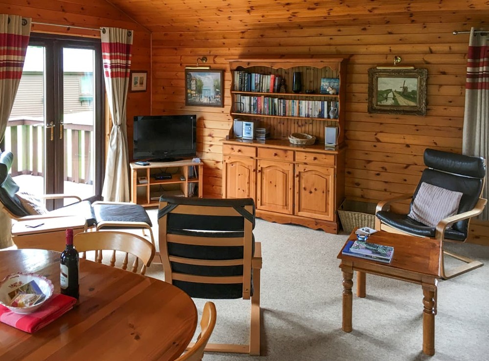 Open plan living space at Birch Lodge in Ardur, Argyll