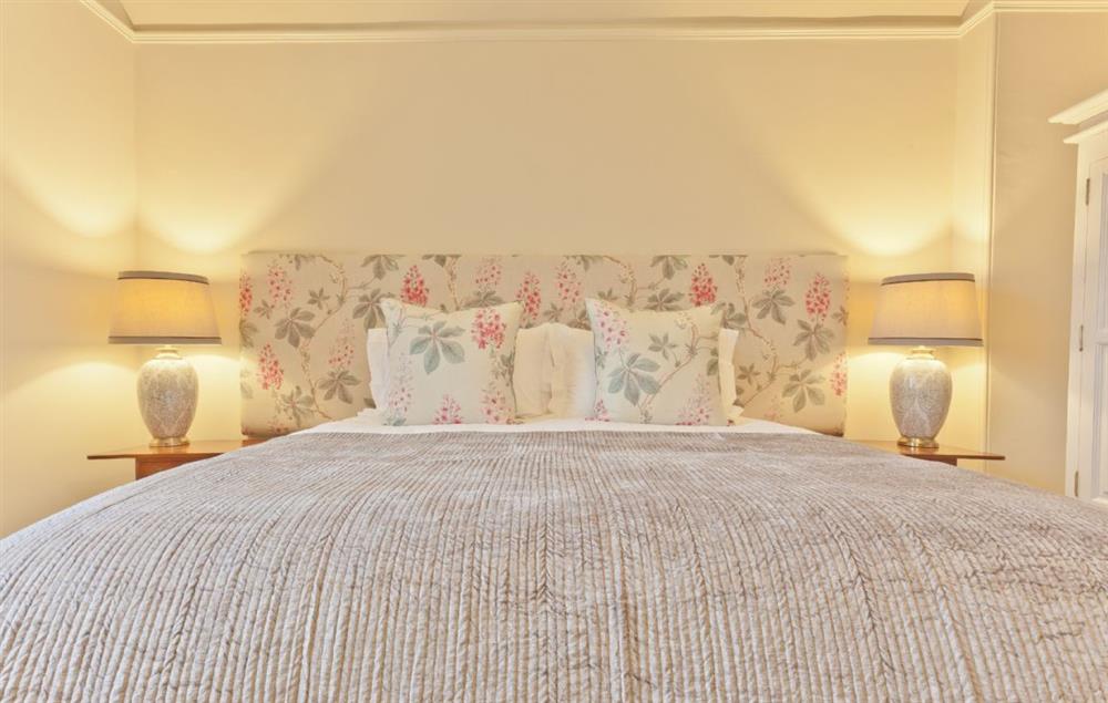 Bedroom with 4’6 double bed and en-suite bathroom at Birkdale House, Windermere