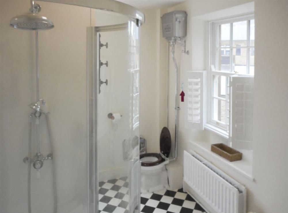Family bathroom with bath and separate shower cubicle at Birkenhead Cottage in Hebden Bridge, Yorkshire, West Yorkshire