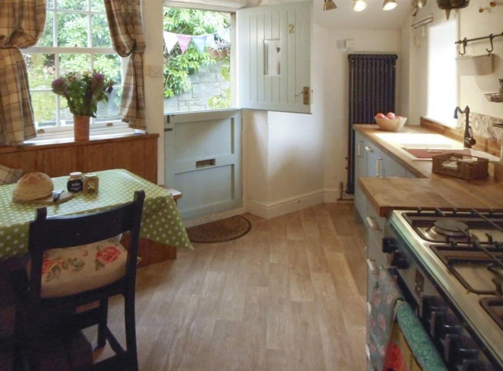 Well-equipped kitchen at Birkenhead Cottage in Hebden Bridge, Yorkshire, West Yorkshire