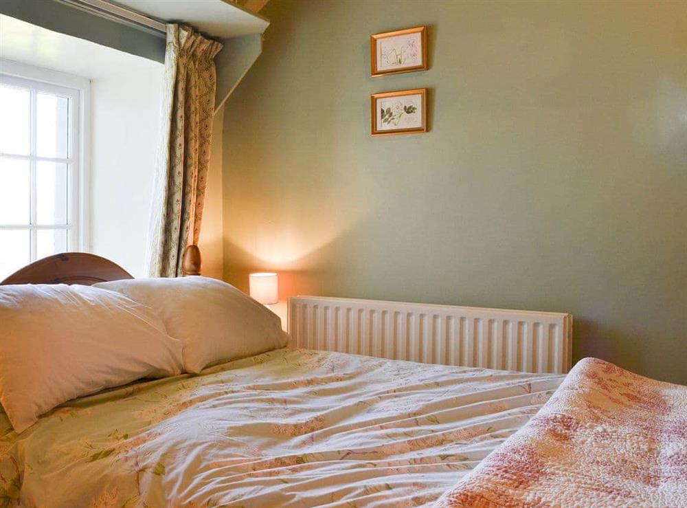 Inviting double bedroom at Birkerthwaite Cottage in Eskdale, Cumbria