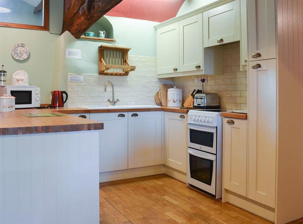 Well fitted and  equipped kitchen at Birkerthwaite Cottage in Eskdale, Cumbria