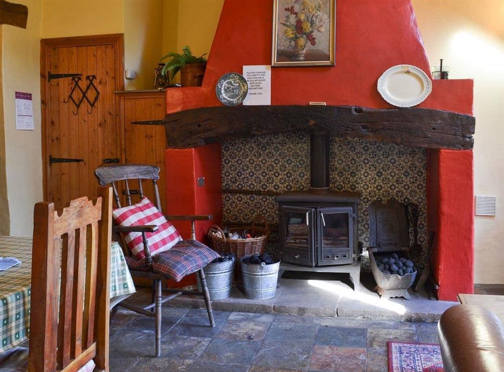 Warm and cosy living area at Birkerthwaite Stable in Eskdale, Cumbria