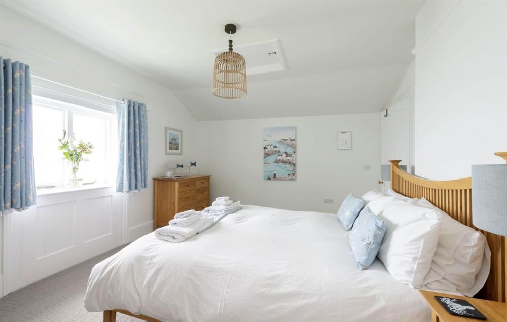 Double bedroom with 5’ king-size bed and sea views (photo 3) at Bishop Rock, The Lizard