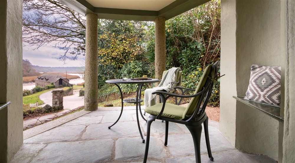 The portico with a table for two and view of the Tamar River, Cornwall