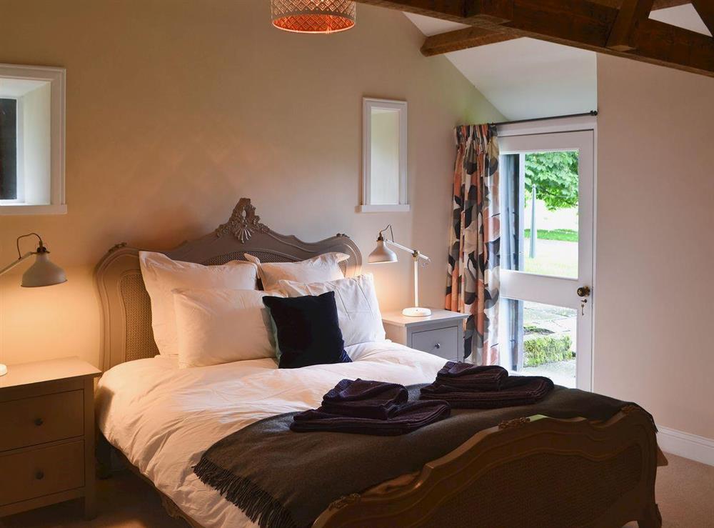 Elegant double bedroom at The Carriage House, 