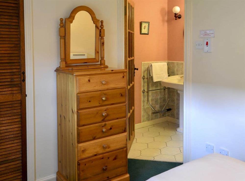Double bedroom with en-suite shower room (photo 2) at Bizzie Lizzie Cottage in Akeld, Wooler, Northumberland., Great Britain