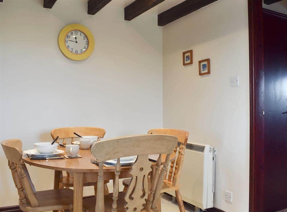 Quaint dining area at Black Bull Cottage in Ugthorpe, near Whitby, Cleveland