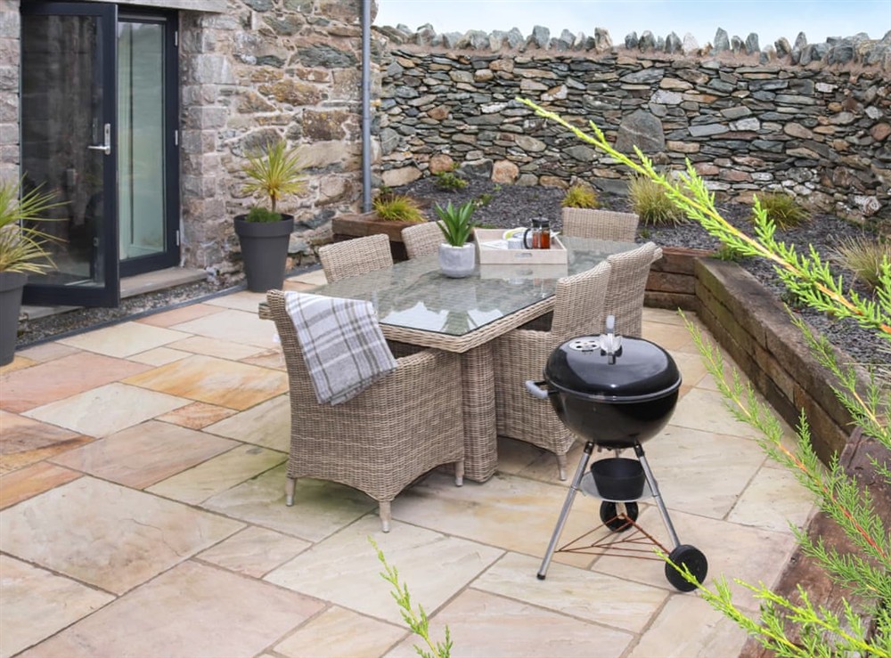 Outdoor eating area (photo 2) at Black Seal Barn in Llanfechell, Gwynedd