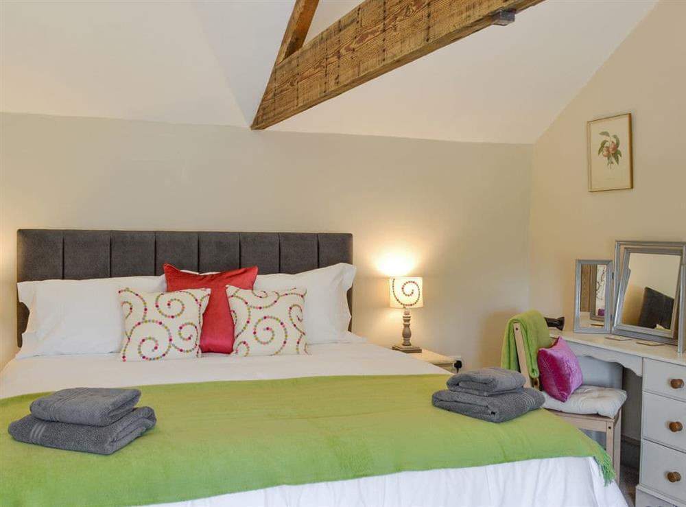 Relaxing double bedroom at Blackcurrant Cottage at Stanton Ford Farm in Baslow, near Bakewell, Derbyshire