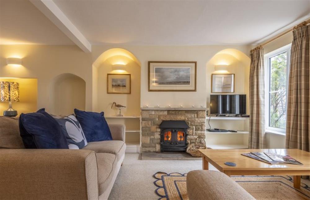 Sitting room with multi-fuel stove at Blackhorse Cottage, Brancaster Staithe near Kings Lynn