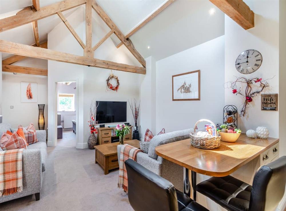 Open plan living space at Blacksmiths Cottage in Balk, near Thirsk, North Yorkshire