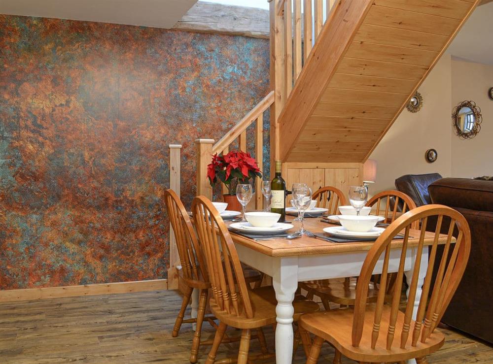 Dining area at Blacksmiths Cottage in Baswick, near Driffield, North Humberside