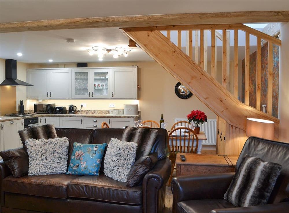 Open plan living space at Blacksmiths Cottage in Baswick, near Driffield, North Humberside