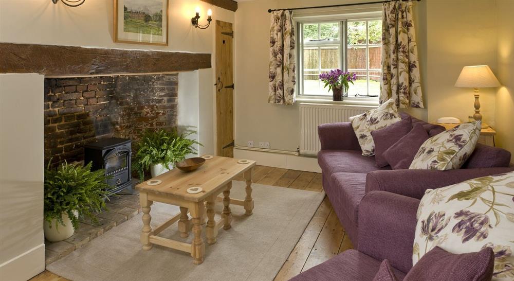 The sitting room at Blacksmith's Cottage in Blicking, Norfolk